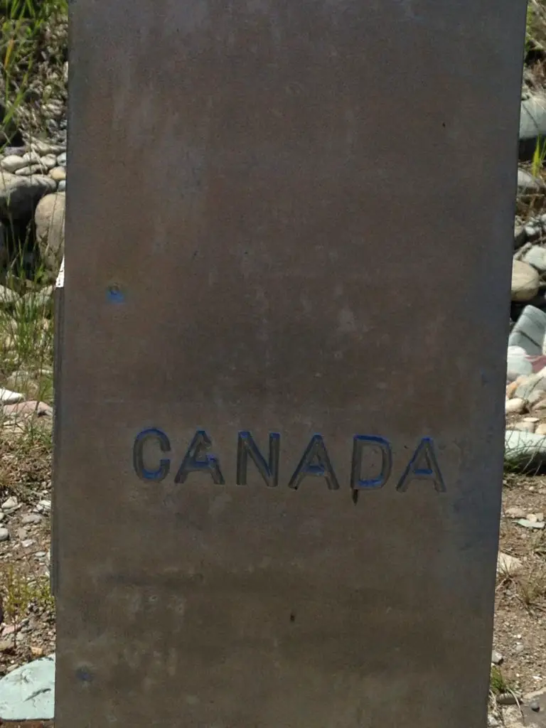 Metal pillar with "United States" written on it