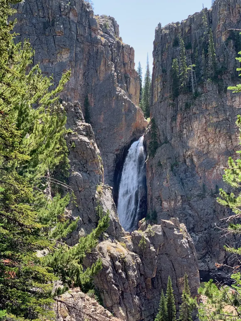 Narrow waterfall amongst rock walls