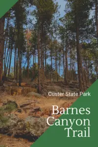 A tree-covered hillside. Pin reads, "Custer State Park, Barnes Canyon Trail"