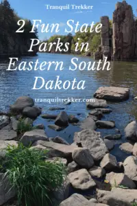 View down a creek with rocky and vegetation-covered walls on both sides, blue sky. Pin reads, "2 Fun State Parks in Eastern South Dakota"