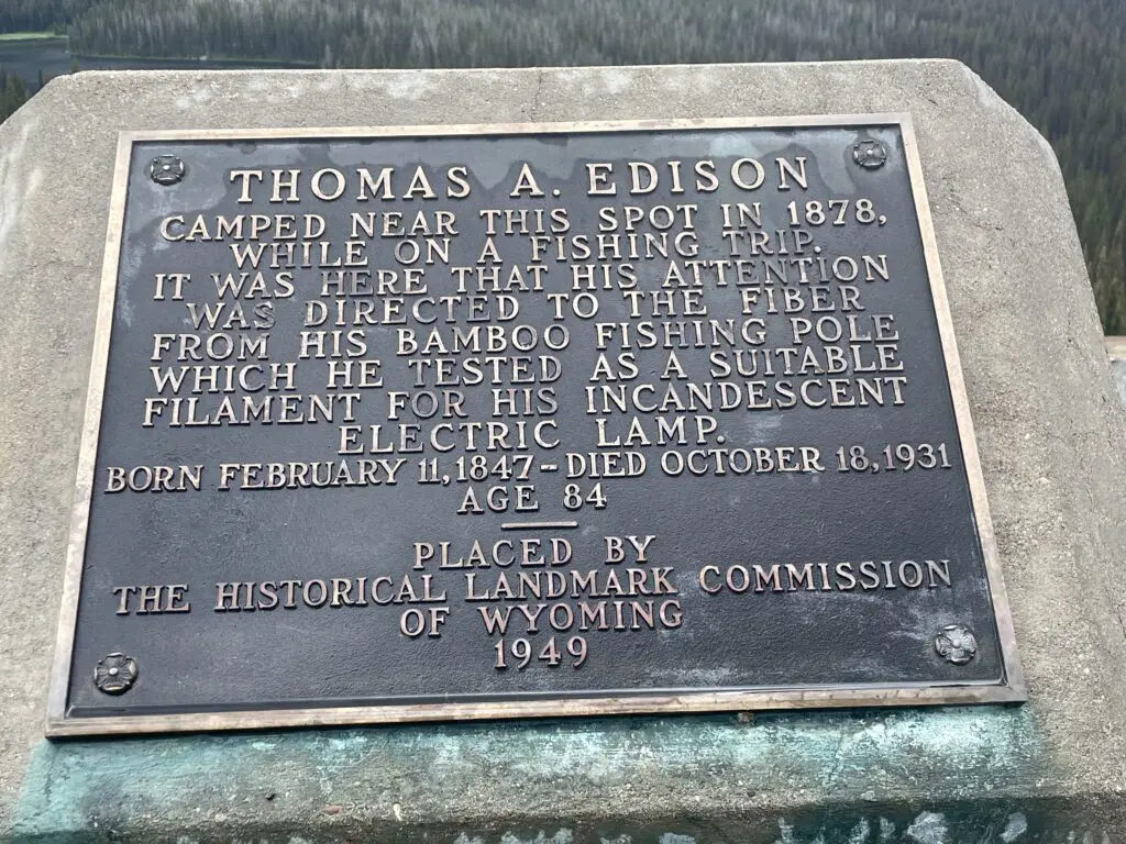 Monument that reads: "Thomas A. Edison camped near this spot in 1878 while on a fishing trip. It was here that his attention was directed to the fiber from his bamboo fishing pole which he tested as a suitable filament for his incandescent electric lamp.--Born February 11, 1847 - Died October 18, 1931 Age 84