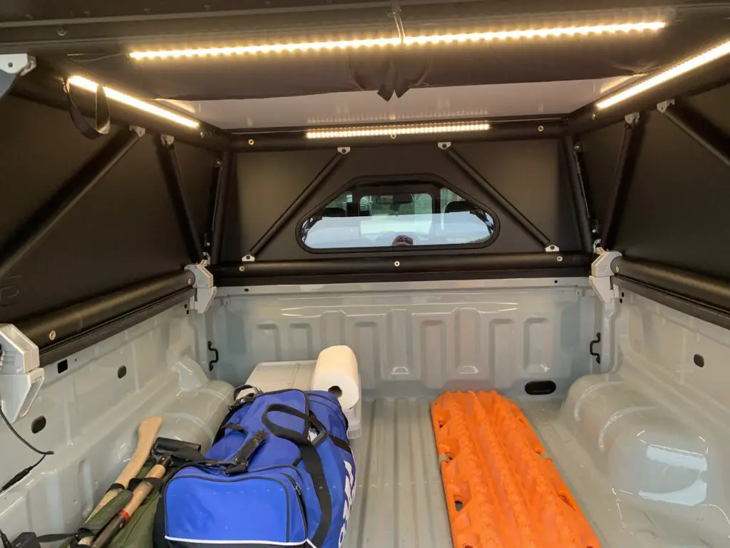 Inside of a truck bed capper topped with LED lights